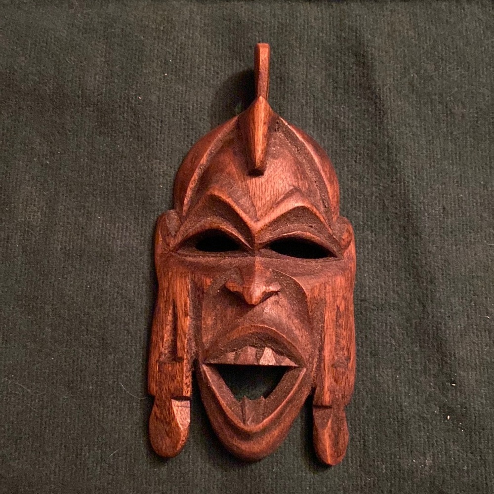 Hand carved wood African mask pendant